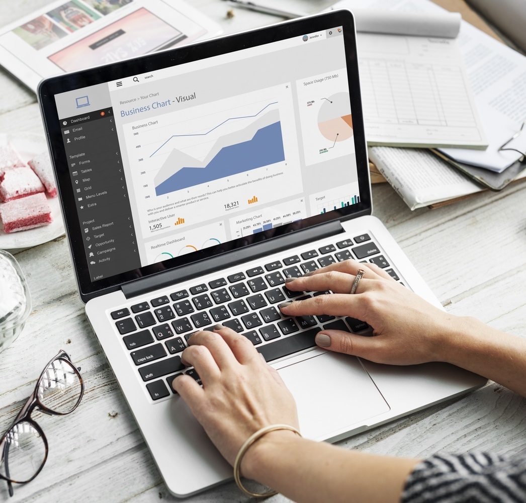 Analytics charts and reports on a laptop
